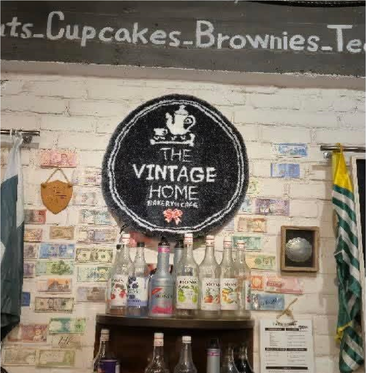 Musafir's gifted a striking custom rug to The Vintage Home's official logo proudly displayed front and center behind our counter.